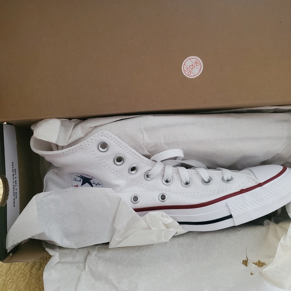White high top Converse sneakers